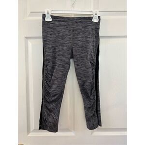 Lululemon cropped legging sheer side panel side zippered pocket in back size 4 g